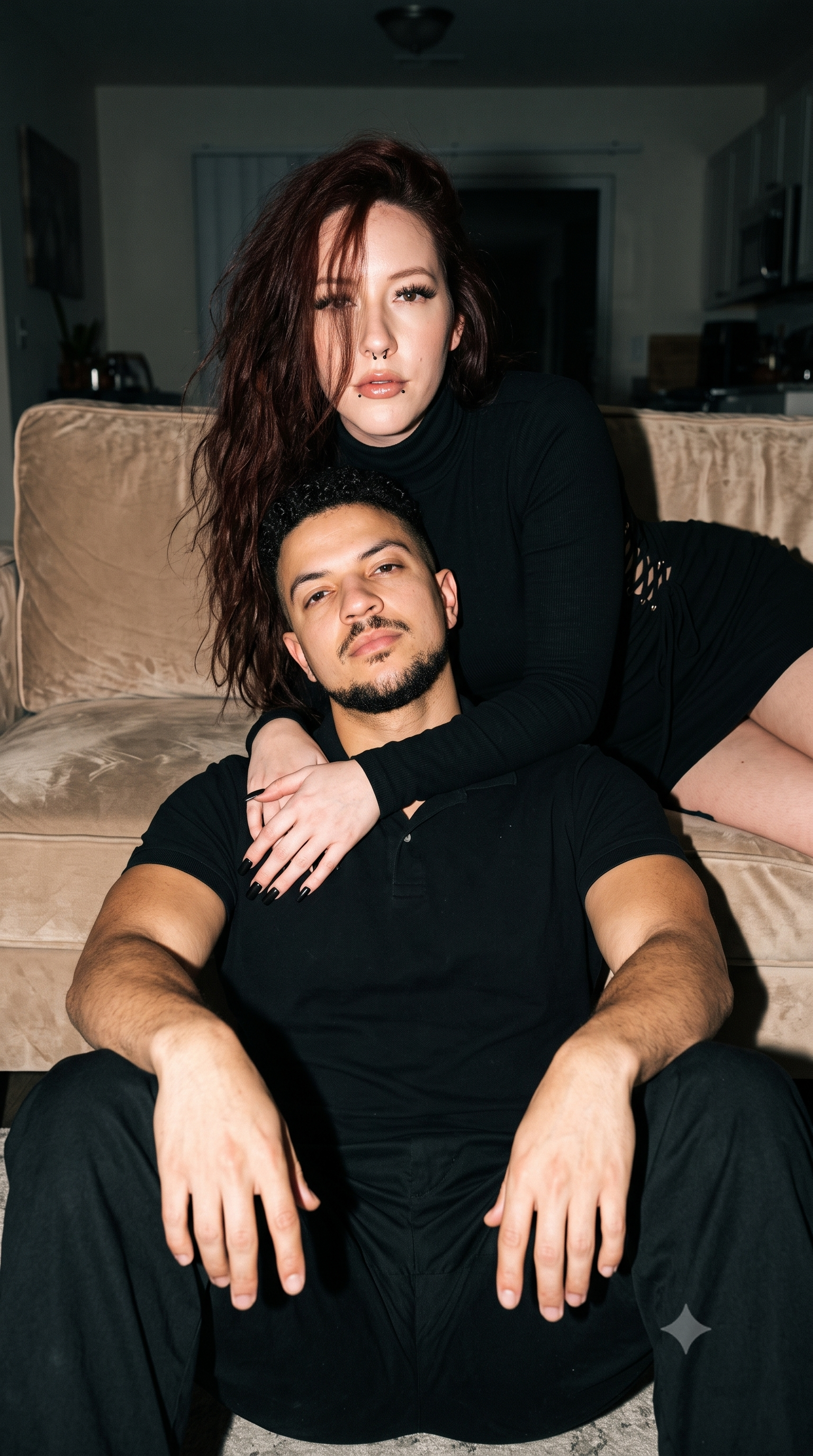 A man is sitting on the floor